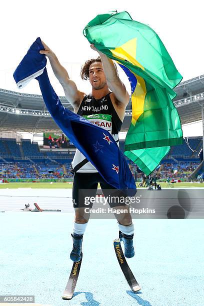 Liam Malone of New Zealand celebrates after winning the Men's 400m T44 final and setting a new world record of 46.20 seconds on day 8 of the Rio 2016...