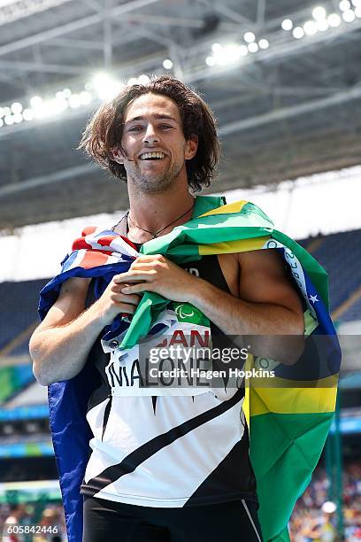 Liam Malone of New Zealand celebrates after winning the Men's 400m T44 final and setting a new world record of 46.20 seconds on day 8 of the Rio 2016...