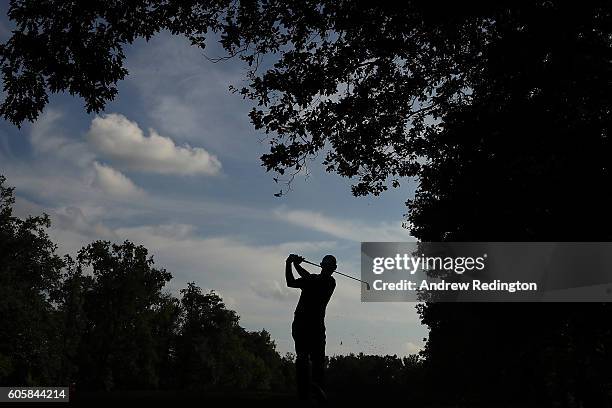 Stephen Gallacher of Scotland hits his second shot on the 9th hole during the first round of the Italian Open at Golf Club Milano on September 15,...