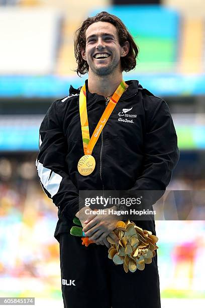 Liam Malone of New Zealand celebrates after winning gold in the Men's 400m T44 final and setting a new world record of 46.20 seconds in the process...