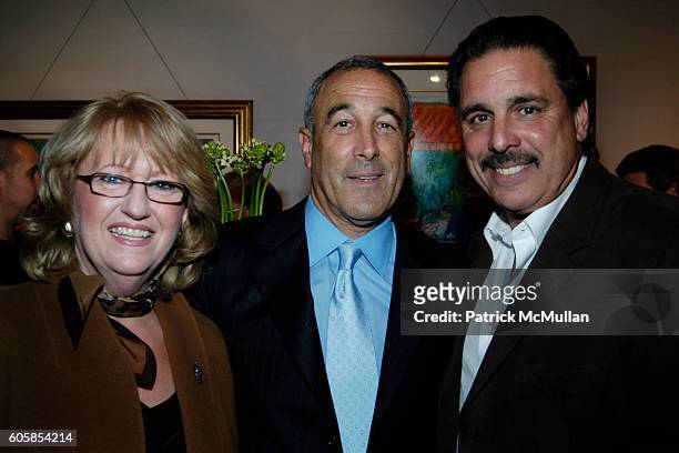Mila Stanco, Mark Udell and Les Stanco attend Omega Watches Texas Hold'em Tournament at Manhasset on October 12, 2006.