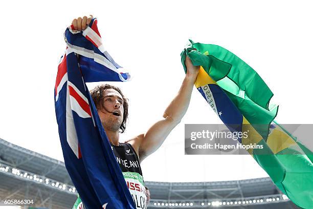 Liam Malone of New Zealand celebrates after winning the Men's 400m T44 final and setting a new world record of 46.20 seconds on day 8 of the Rio 2016...