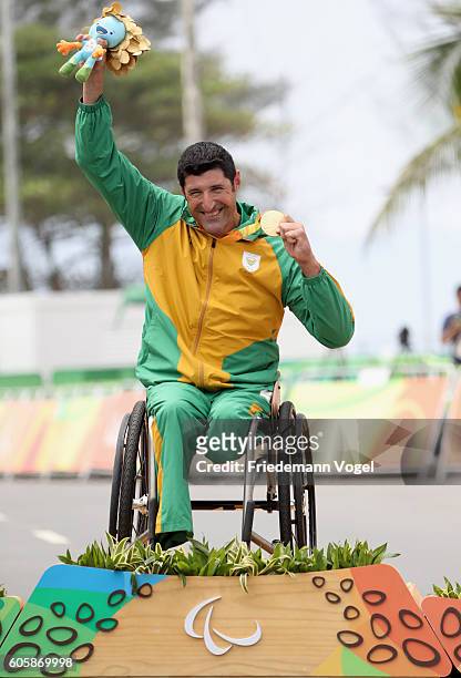 Ernst van Dyk of South Africa celebrates on the podium at the medal ceremony for the Men's Road Race H5 on day 8 of the Rio 2016 Paralympic Games at...