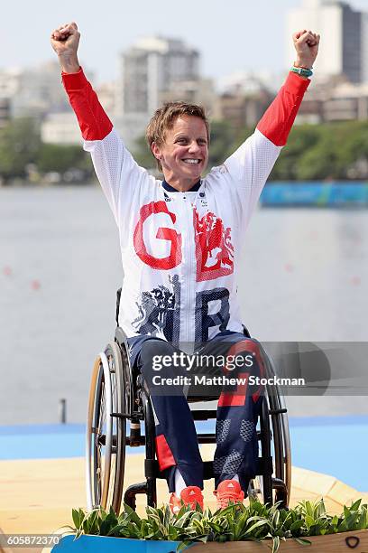 Emma Wiggs of Great Britain celebrates on the medals podium after winning the women's KL2 final at Lagoa Stadium during day 8 of the Rio 2016...