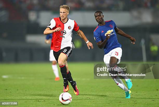 Nicolai Jorgensen of Feyenoord is chased down by Eric Bailly of Manchester United during the UEFA Europa League Group A match between Feyenoord and...