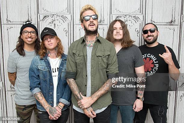 Phil Manansala, Alan Ashby, Austin Carlile, Aaron Pauley, and Valentino Arteaga of the band "Of Mice and Men" attend the AOL Build Speaker Series to...