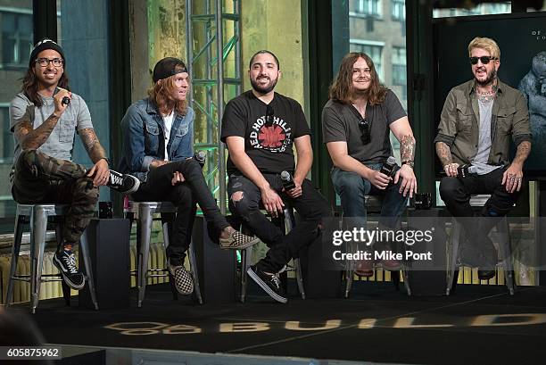 Phil Manansala, Alan Ashby, Valentino Arteaga, Aaron Pauley, and Austin Carlile of the band "Of Mice and Men" attend the AOL Build Speaker Series to...