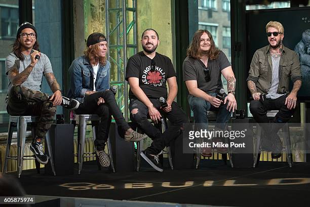 Phil Manansala, Alan Ashby, Valentino Arteaga, Aaron Pauley, and Austin Carlile of the band "Of Mice and Men" attend the AOL Build Speaker Series to...