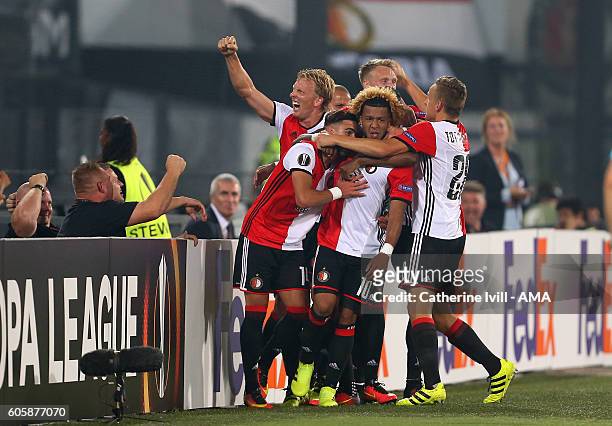 Tonny Vilhena of Feyenoord celebrates with his team mates after he scores a goal to make it 1-0 during the UEFA Europa League match between Feyenoord...