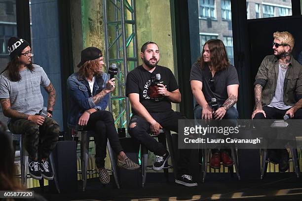 Phil Manansala, Alan Ashby, Valentino "Tino" Arteaga, Aaron Pauley and Austin Carlile of the band Of Mice and Men attend The BUILD Series to discuss...