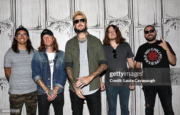 Phil Manansala, Alan Ashby, Austin Carlile, Aaron Pauley and Valentino "Tino" Arteaga of the band Of Mice and Men attend The BUILD Series to discuss...