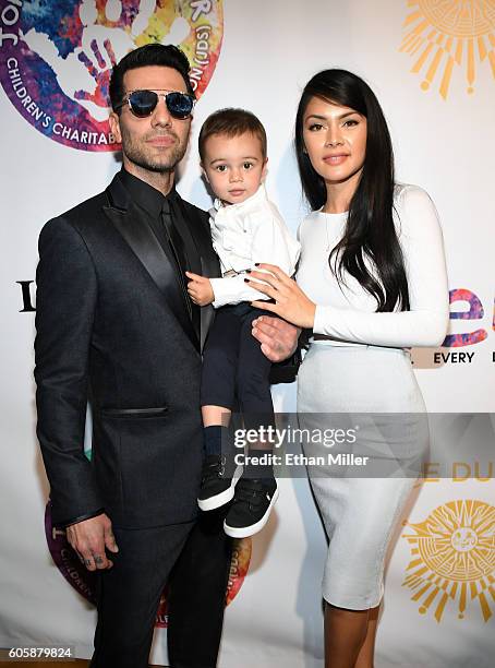 Illusionist Criss Angel, his son Johnny Crisstopher Sarantakos and his mother Shaunyl Benson attend Criss Angel's HELP charity event at the Luxor...