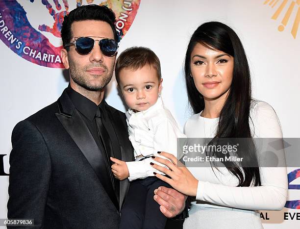 Illusionist Criss Angel, his son Johnny Crisstopher Sarantakos and his mother Shaunyl Benson attend Criss Angel's HELP charity event at the Luxor...