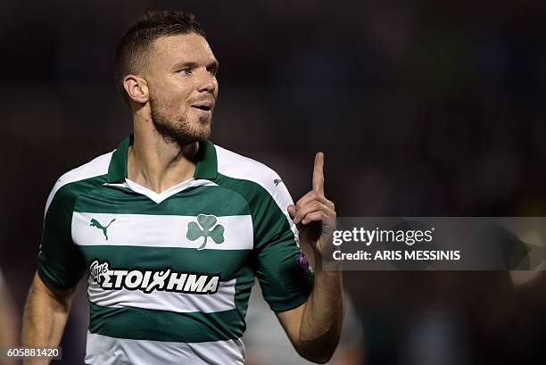 Panathinaikos' Marcus Berg celebrates after scoring a goal during the group G Europa League football match between Panathinaikos and Ajax Amsterdam...