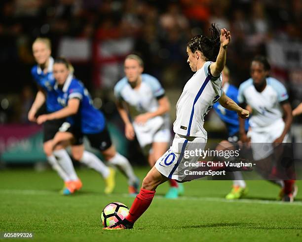 England women's Karen Carney scores her sides fifth goal from the penalty spot during the UEFA Womens European Championship Qualifying Group 7 match...