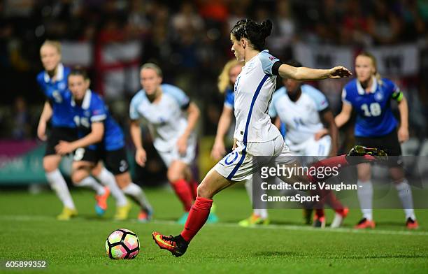 England women's Karen Carney scores her sides fifth goal from the penalty spot during the UEFA Womens European Championship Qualifying Group 7 match...