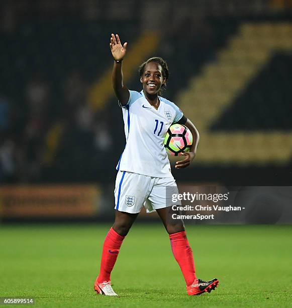 England women's Danielle Carter, who scored a hat-trick, waves to the crowd whilst holding the match ball at the end of the UEFA Womens European...
