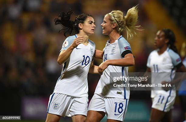 Karen Carney of England celebrates scoring their fifth goal from the penalty spot with Rachel Daly during the UEFA Women's Euro 2017 Qualifier match...