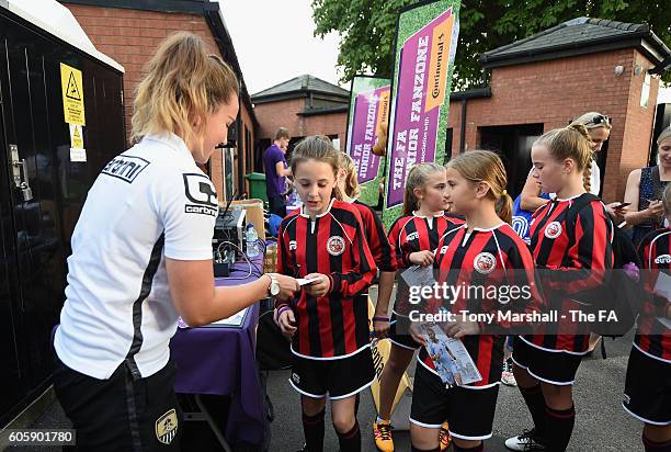 Amy Turner of Notts County Ladies signing autographs at the Fanzone during the UEFA Women's Euro 2017 Qualifier match between England Women and...