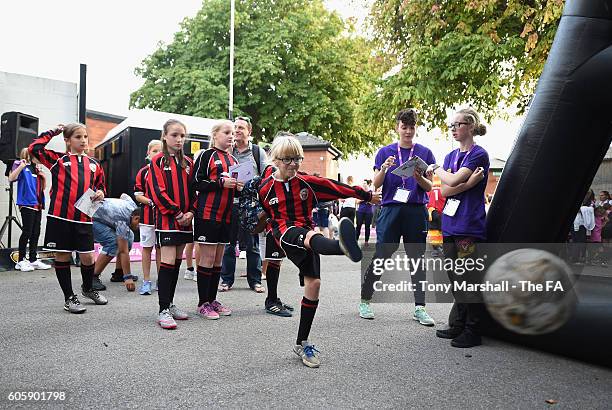 Fans take part in the Continental Speed Cage at the Fanzone during the UEFA Women's Euro 2017 Qualifier match between England Women and Estonia Women...