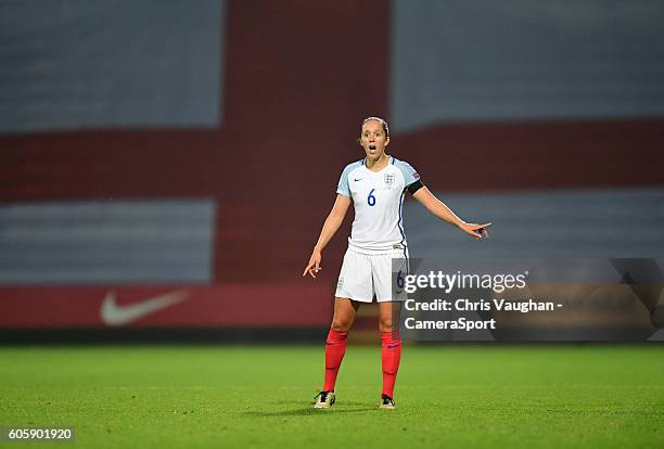 England women's Jo Potter shouts instructions to her team-mates whilst stood in front of a large flag of St George during the UEFA Womens European...