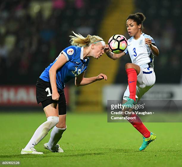 England women's Demi Stokes vies for possession with Estonia women's Liis Lepik during the UEFA Womens European Championship Qualifying Group 7 match...