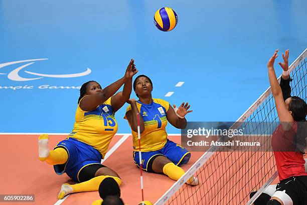 Lilliane Mukobwankawe of Rwanda receives the ball in sitting volleyball women's 7-8 classification match 13 on day 8 of the Rio 2016 Paralympic Games...