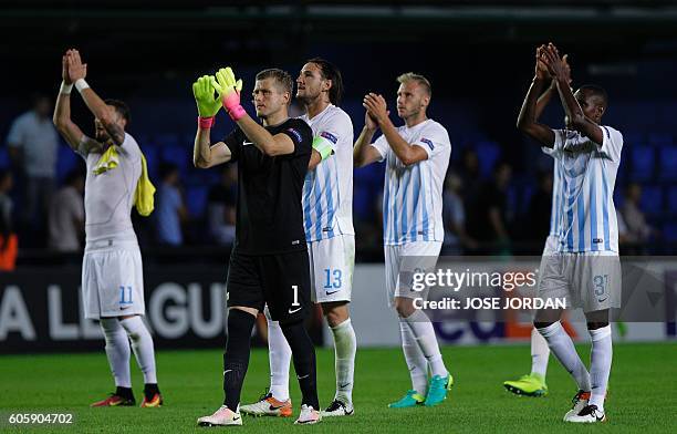 Zurich's players applaud their supporters at the end of the UEFA Europa League Group L football match Villarreal CF vs FC Zurich at El Madrigal...