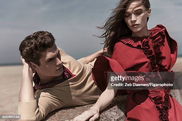 Actress Anna Brewster and model Arthur Gosse are photographed for Madame Figaro on June 24, 2016 in Deauville, France. Arthur: Sweater , scarf ....