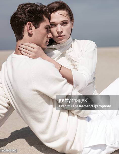 Actress Anna Brewster and model Arthur Gosse are photographed for Madame Figaro on June 24, 2016 in Deauville, France. Arthur: Sweater , pants ....