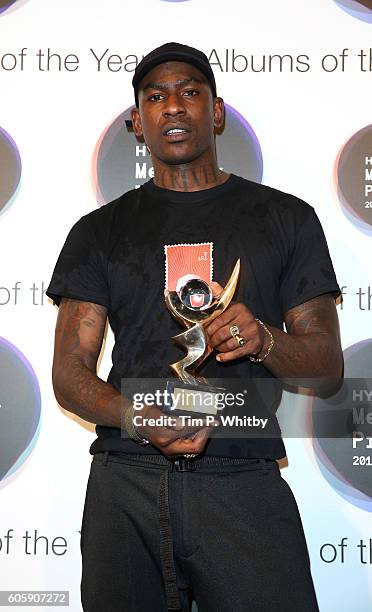 Joseph Junior Adenuga aka Skepta poses for a photo shortly after being announced the winner of the Mercury Prize 2016 at the Hyundai Mercury Prize...