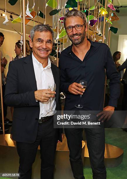 Harry Handelsman and Noe Duchaufour-Lawrance attend the opening party for L'Eden by Perrier-Jouet in London's Wardour Street on September 15, 2016 in...