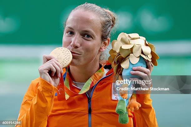 Jiske Griffioen of the Netherlands poses for photographers after defeating Aniek van Koot of the Netherlands in the women's singles gold medal match...