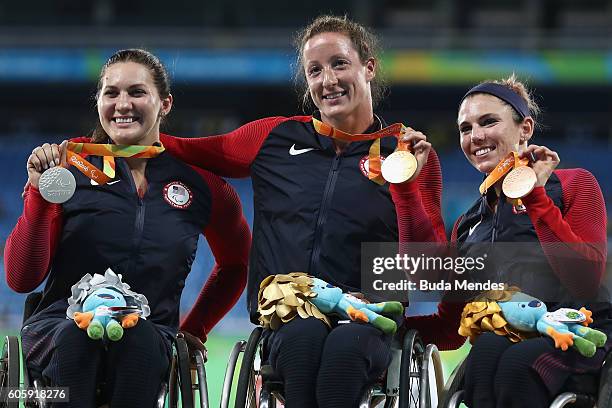 Silver medal Chelsea McClammer, Gold medal Tatyana McFadden and Bronze medal Amanda McGrory of the United States celebrate the triple american podium...