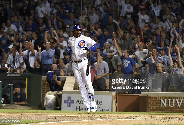 Jorge Soler of the Chicago Cubs watches his two-run homer against the Milwaukee Brewers during the second inning on September 15, 2016 at Wrigley...