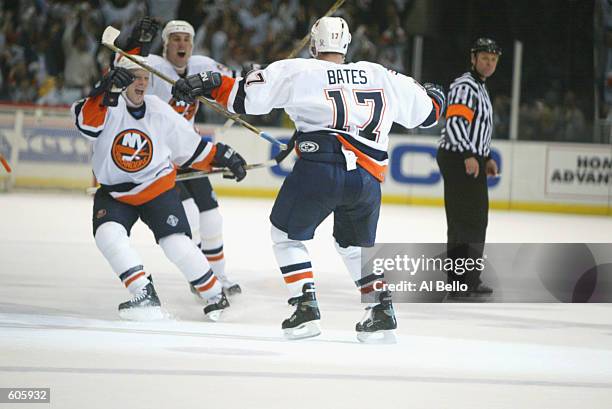 Shawn Bates of the New York Islanders celebrates his winning goal against the Toronto Maple Leafs during game four of the Stanley Cup playoffs at the...