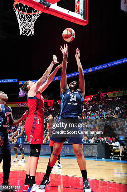 Markeisha Gatling of the Atlanta Dream shoots the ball against Stefanie Dolson of the Washington Mystics on September 15, 2016 at Philips Arena in...