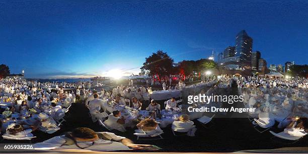 Thousands of people attend the annual 'Diner en Blanc' in Battery Park City, September 15, 2016 in New York City. Diner en Blanc was launched in...