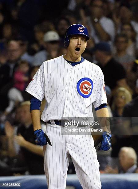 Mike Montgomery of the Chicago Cubs reacts after hitting an RBI single against the Milwaukee Brewers during the fourth inning on September 15, 2016...