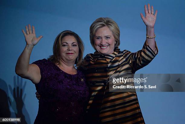 Presidential nominee Hillary Clinton and Linda Sanchez wave to the audience during the The Congressional Hispanic Caucus Awards Gala commemoriating...