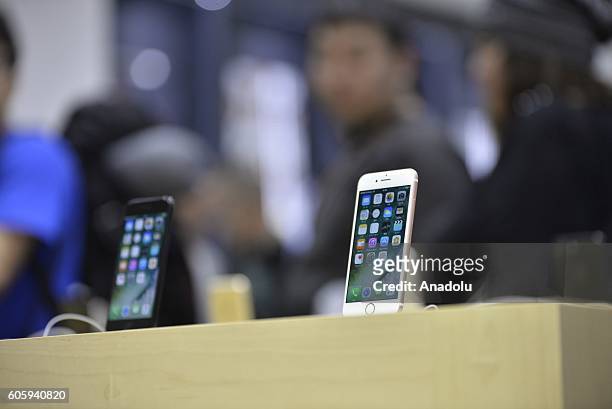 New iPhone models are seen on display at a telecom shop in Omotesando Avenue in Tokyo, Japan on September 16, 2016. Apple has released for sale its...