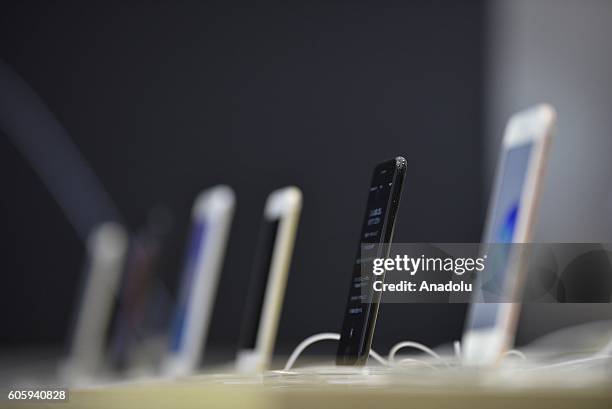 New iPhone models are seen on display at a telecom shop in Omotesando Avenue in Tokyo, Japan on September 16, 2016. Apple has released for sale its...