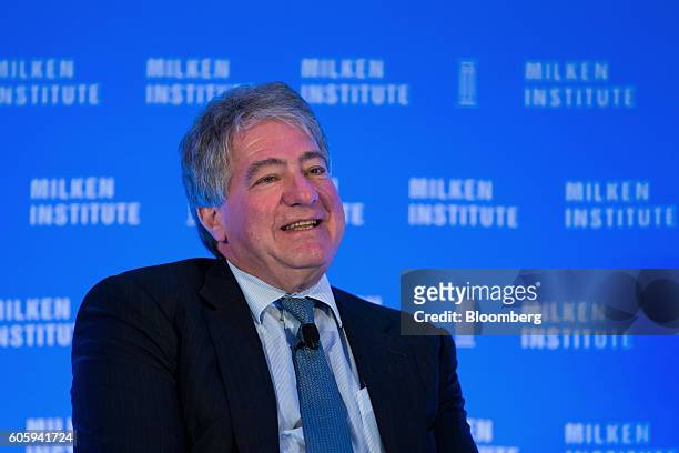 Leon Black, chairman and chief executive officer of Apollo Global Management LLC, speaks at the Milken Institute Asia Summit in Singapore, on Friday,...