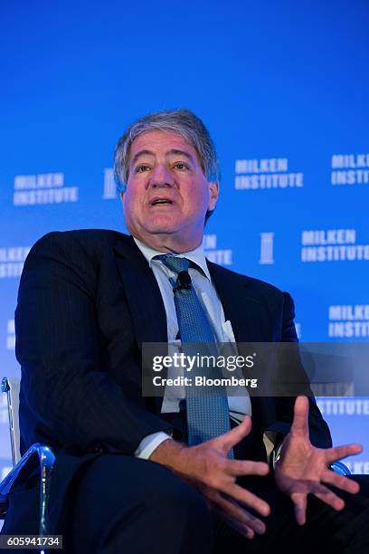 Leon Black, chairman and chief executive officer of Apollo Global Management LLC, speaks at the Milken Institute Asia Summit in Singapore, on Friday,...