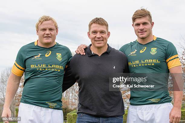 Adriaan Strauss of the Springboks, former Springbok captain John Smit and Malcolm Marx of the Springboks pose during the South African Springboks...