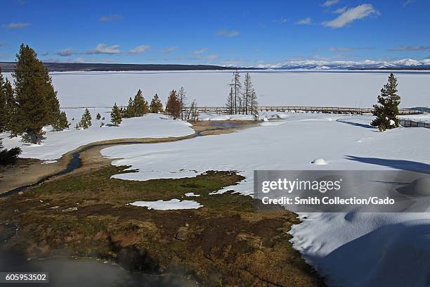 Yellowstone Lake as seen from Bluebell Pool in West Thumb Geyser Basin, Yellowstone National Park, Wyoming, February, 2014. Image courtesy Jim...