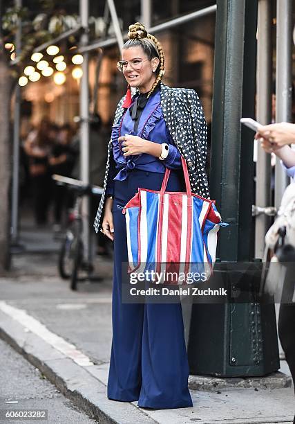Nana Cunha is seen wearing a Marc Jacobs top, Max Mara jacket and a Balenciaga bag outside the Marc Jacobs show during New York Fashion Week Spring...