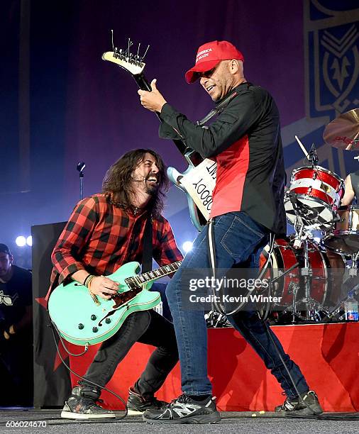 Musician Dave Grohl joins musician Tom Morello of Prophets of Rage onstage at the Forum on September 15, 2016 in Inglewood, California.