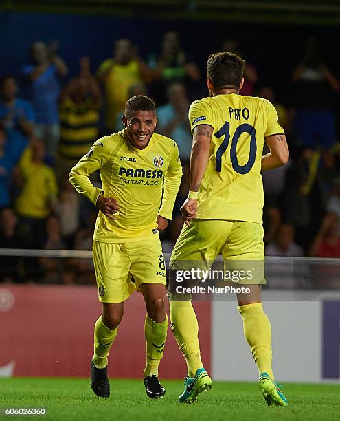 Jonathan Dos Santos of Villarreal CF celebrates his goal with Alexandre Pato during the UEFA Europa League match at Estadio El Madrigal, Villarreal...