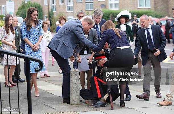 Catherine, Duchess of Cambridge looks on as Prince William, Duke of Cambridge rushes to helpVice Lord Lieutenant of Essex Jonathon Douglas-Hughes who...